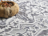 Quintella Area Rug