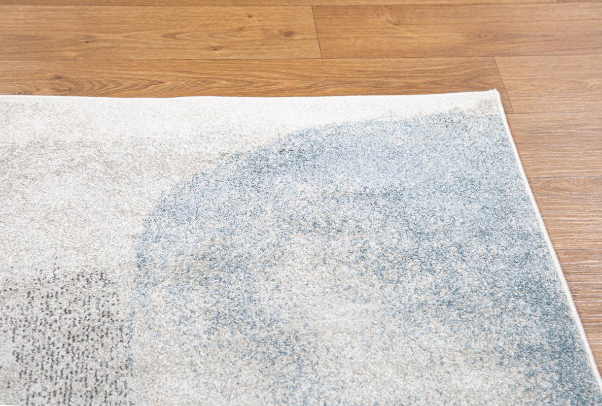 Peristerona Area Rug