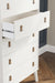 Ashley Express - Aprilyn Queen Panel Headboard with Dresser, Chest and Nightstand - Walo Furniture