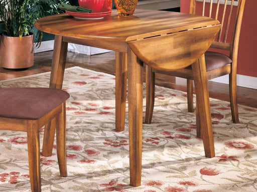 Ashley Express - Berringer Round DRM Drop Leaf Table - Walo Furniture