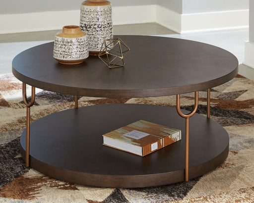 Ashley Express - Brazburn Round Cocktail Table - Walo Furniture