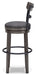 Ashley Express - Caitbrook UPH Swivel Barstool (1/CN) - Walo Furniture