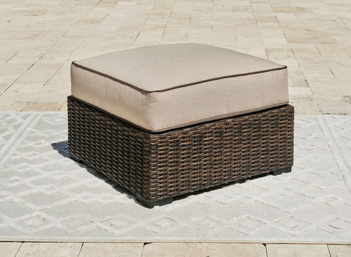 Ashley Express - Coastline Bay Ottoman with Cushion - Walo Furniture