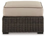 Ashley Express - Coastline Bay Ottoman with Cushion - Walo Furniture