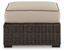 Ashley Express - Coastline Bay Ottoman with Cushion - Walo Furniture