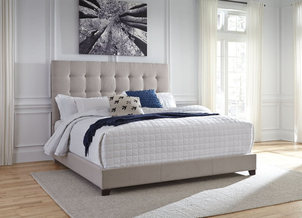 Ashley Express - Dolante Queen Upholstered Bed - Walo Furniture