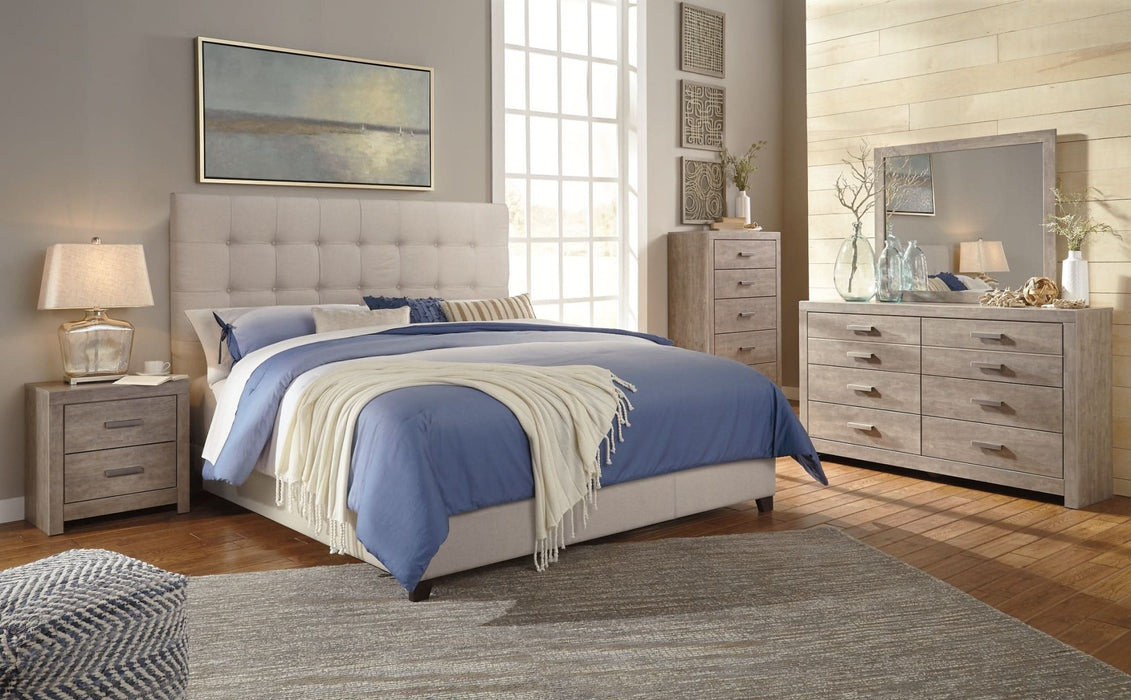 Ashley Express - Dolante Queen Upholstered Bed - Walo Furniture