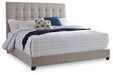 Ashley Express - Dolante Queen Upholstered Bed - Walo Furniture