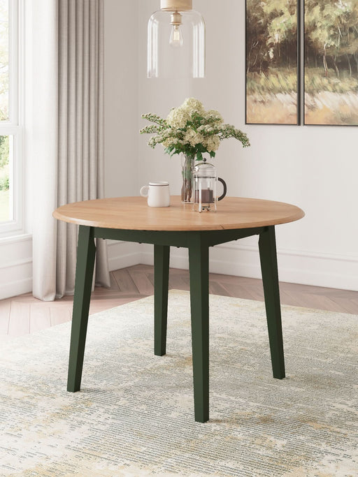 Ashley Express - Gesthaven Round DRM Drop Leaf Table - Walo Furniture