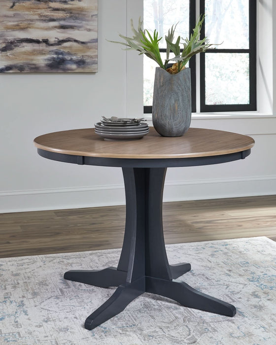 Ashley Express - Landocken Round Dining Room Table - Walo Furniture