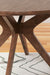 Ashley Express - Lyncott Round Dining Room Table - Walo Furniture