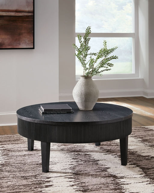 Ashley Express - Marstream Round Cocktail Table - Walo Furniture