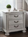 Ashley Express - Montelaine Three Drawer Night Stand - Walo Furniture