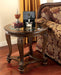 Ashley Express - Norcastle Round End Table - Walo Furniture