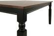 Ashley Express - Owingsville Rectangular Dining Room Table - Walo Furniture