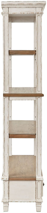 Ashley Express - Realyn Bookcase - Walo Furniture