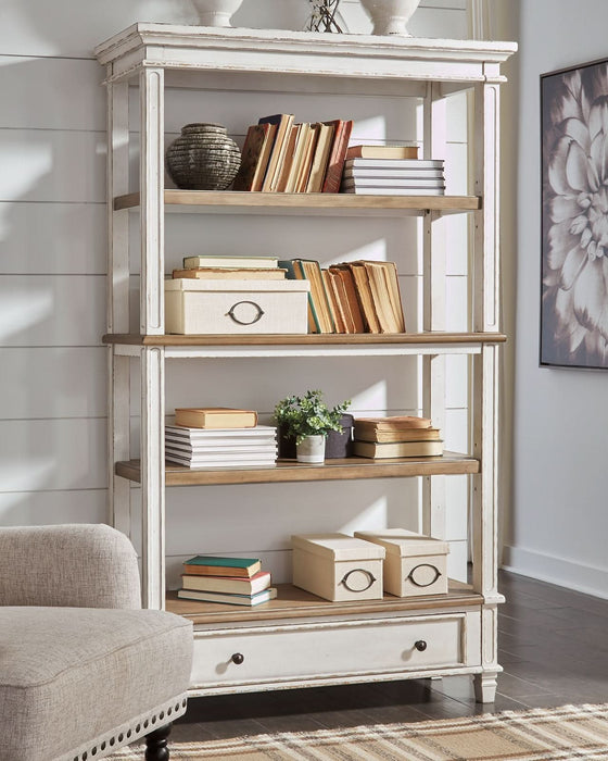 Ashley Express - Realyn Bookcase - Walo Furniture