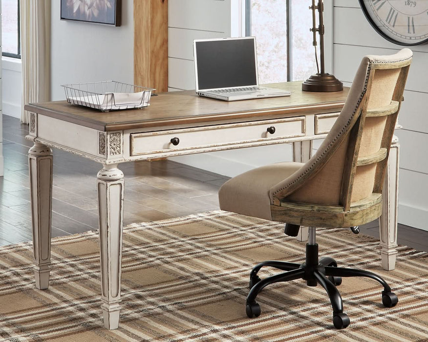 Ashley Express - Realyn Home Office Desk - Walo Furniture