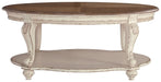 Ashley Express - Realyn Oval Cocktail Table - Walo Furniture