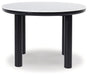 Ashley Express - Xandrum Round Dining Room Table - Walo Furniture